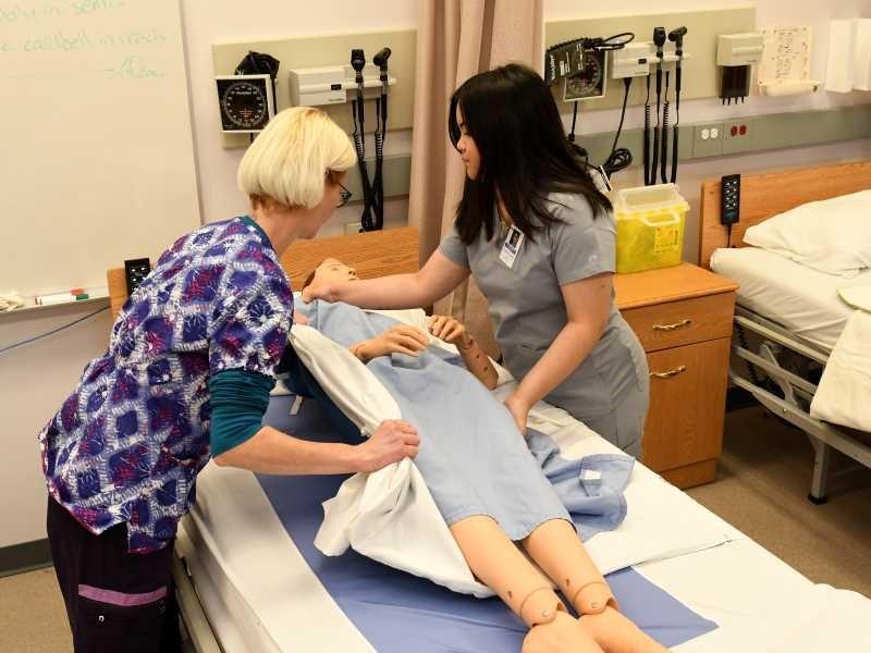 Learning how to move a patient in their bed.