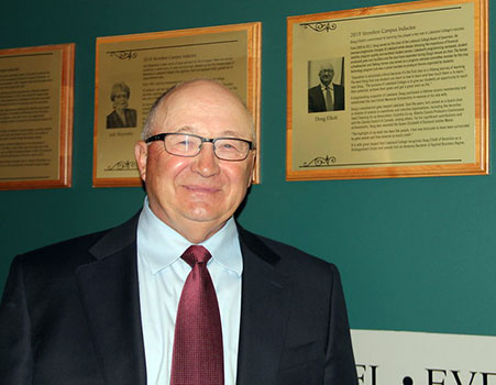 Doug Elliott by plaque