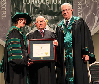 Elliott receiving honorary degree