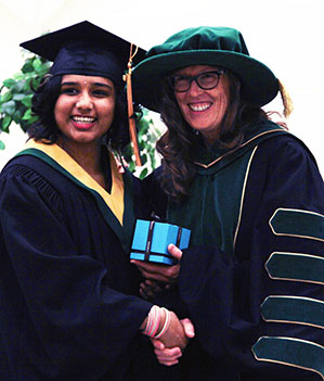 Krupa shaking hands with Alice